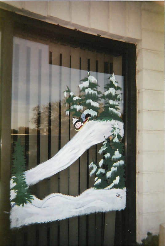 Sledding kid - window painting - Image: M Burgess