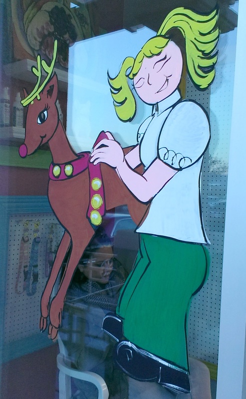Reindeer and girl window painting